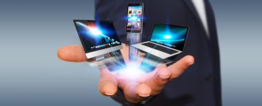 Teknik cihaz elinde tutan işadamı