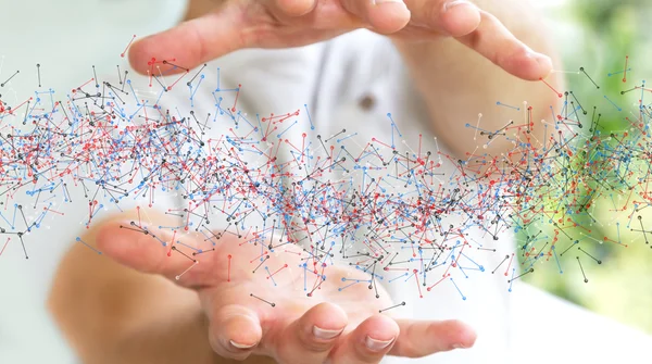 Man holding DNA structure in his hand — Stock Photo, Image