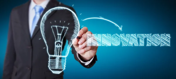 Businessman drawing a sketch lightbulb innovation concept — Stock Photo, Image