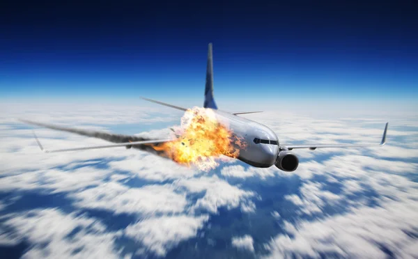 Plane in the sky with engine on fire