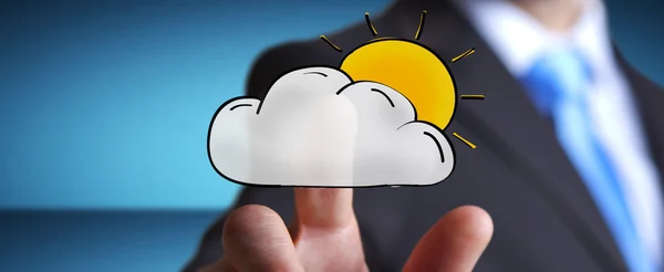 Uomo d'affari toccare mano disegnato nuvola e sole icone — Foto Stock