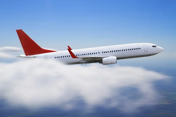 Avión volando sobre la nube — Foto de Stock