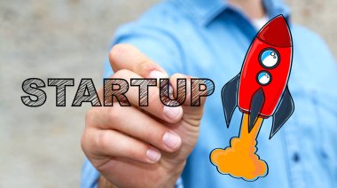 Başlangıç metin ve kırmızı roket kalemle çizim işadamı