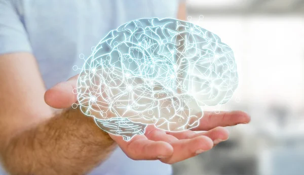 Чоловік тримає в руці рентгенівський людський мозок — стокове фото