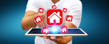 Bir daire kiralamak için modern cep telefonu kullanarak iş adamı