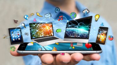 İşadamı bağlı teknik cihazlar ve simgeler uygulamaların