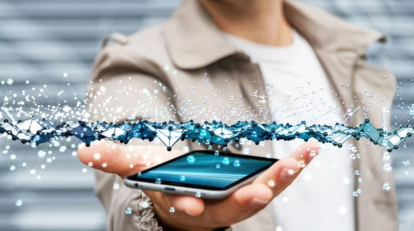 Бізнесмен тримає абстрактне хвильове з'єднання над своїм мобільним фені — стокове фото