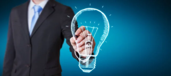 Businessman drawing a sketch lightbulb innovation concept — Stock Photo, Image