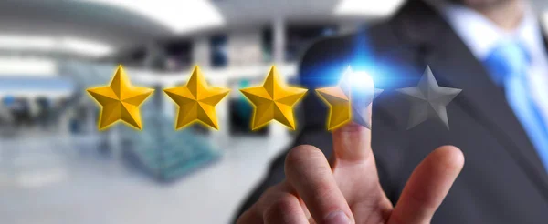 Businessman rating stars with his hand