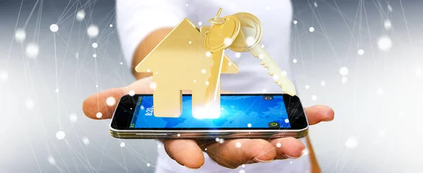 Empresário segurando chave com chaveiro casa sobre telefone renderi 3D — Fotografia de Stock