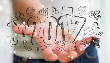 2017 elle çizilmiş metin tutan işadamı