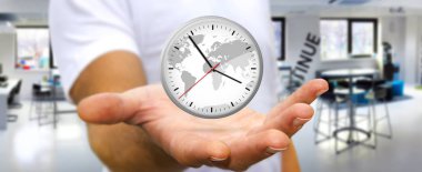 İş adamı elinde bir saat tutuyor.