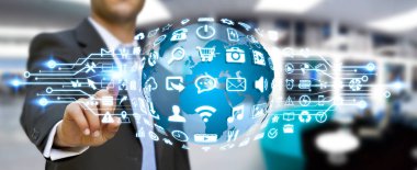 Dijital dünya ile web simgeleri kullanarak iş adamı