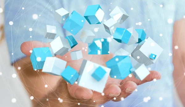 Empresario sosteniendo vuelo azul brillante cubo 3D renderizado —  Fotos de Stock