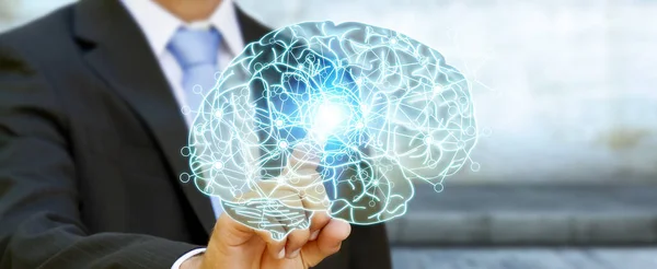 Бізнесмен торкається рентгенівського людського мозку пальцем — стокове фото