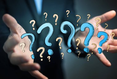 Elle çizilmiş soru işaretleri elinde tutan işadamı