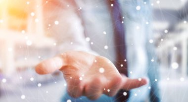 Kayan nokta ağ 3d render tutan işadamı