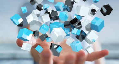 Mavi parlak küp ağ 3d renderin yüzen tutan işadamı