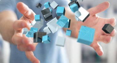 Mavi parlak küp ağ 3d renderin yüzen tutan işadamı