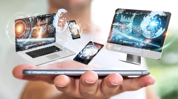 Empresário conectando dispositivos tecnológicos com seu telefone móvel 3D ren — Fotografia de Stock