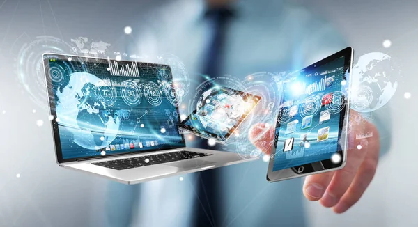 Businessman connecting tech devices to each other 3D rendering — Stock Photo, Image