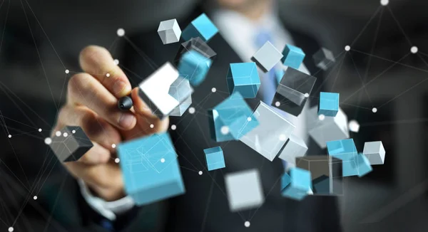 Businessman holding floating blue shiny cube network 3D renderin — Stock Photo, Image