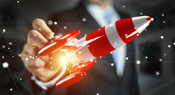 Podnikatel, drží červené raketě v jeho rukou 3d vykreslování — Stock fotografie