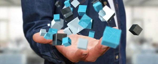 Podnikatel, drží plovoucí modré lesklé kostky síť 3d renderin — Stock fotografie