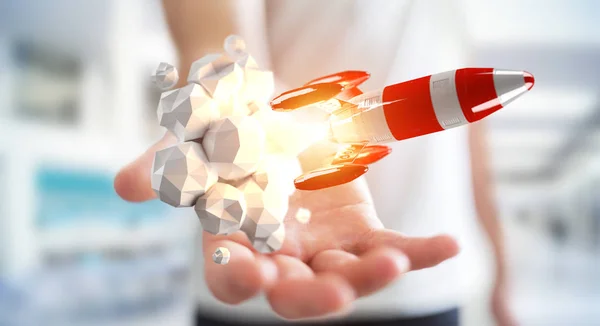 Empresario sosteniendo cohete rojo en su mano representación 3D — Foto de Stock