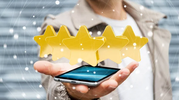 Businessman rating stars with his mobile phone 3D rendering — Stock Photo, Image