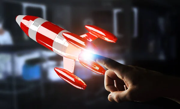 Pengusaha memegang roket merah di tangannya 3D rendering — Stok Foto