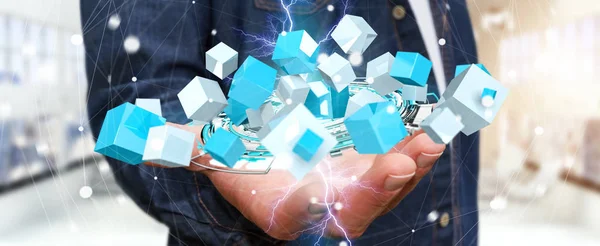 Businessman holding flying blue shiny cube 3D rendering — Stock Photo, Image