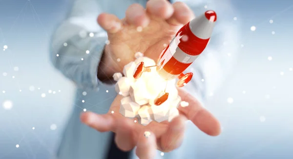 Бізнесмен тримає червону ракету в руці 3D рендеринга — стокове фото