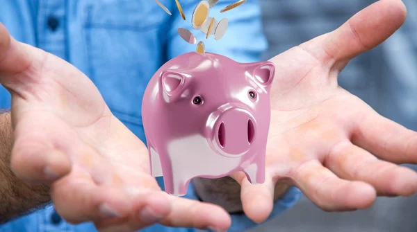 Empresário segurando porquinho banco com moedas voando para dentro 3D — Fotografia de Stock