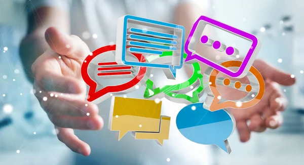 Businessman using digital colorful 3D rendering conversation ico — Stock Photo, Image