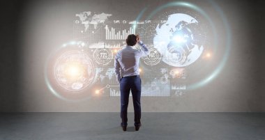 Bir duvara 3d render grafik ekranlar arabirimini kullanarak iş adamı