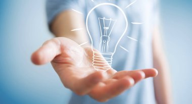 Bir kroki ampul tutan işadamı