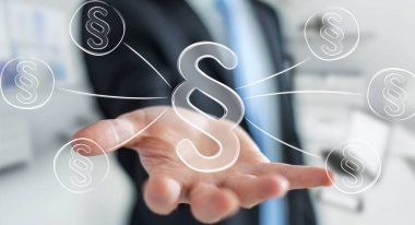 Hukuk koruma sağ sembol tutan işadamı