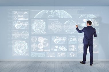 Bir duvara 3d render grafik ekranlar arabirimini kullanarak iş adamı