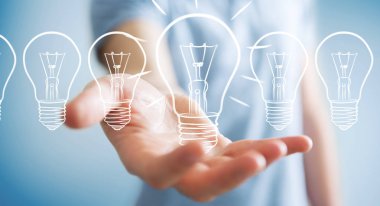 Bir kroki ampul tutan işadamı