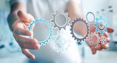 Simgeleri çizilmiş tutan işadamı vites