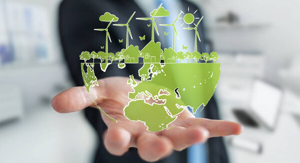 Businessman holding renewable energy sketch