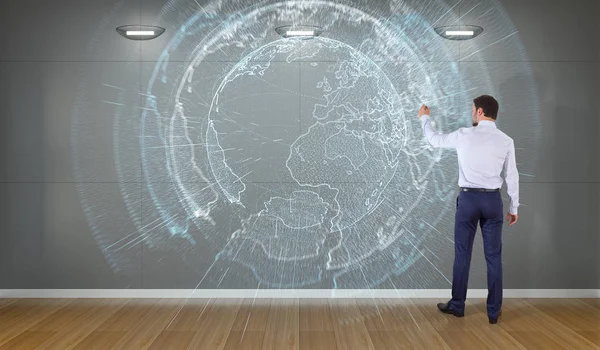 Bir duvar 3d re dijital planet earth arabirimini kullanarak iş adamı