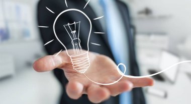 Bir kroki ampul tutan işadamı