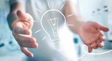 Bir kroki ampul tutan işadamı