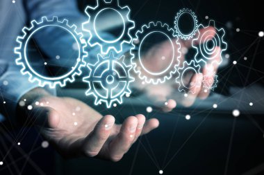 Simgeleri çizilmiş tutan işadamı vites