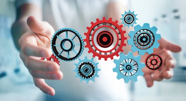 Onun el 3d render kayan dişli simgeleri tutan işadamı