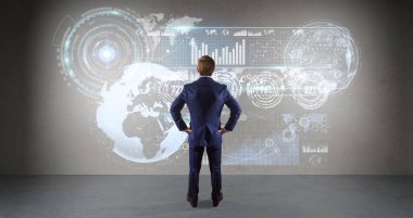 Bir duvara 3d render grafik ekranlar arabirimini kullanarak iş adamı