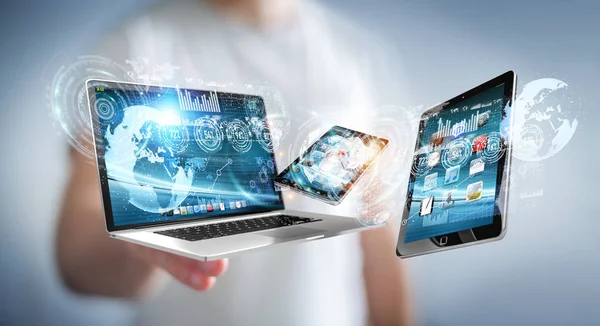 Businessman connecting tech devices to each other 3D rendering — Stock Photo, Image