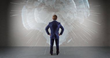 Bir duvar 3d re dijital planet earth arabirimini kullanarak iş adamı